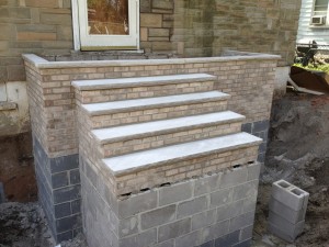 Below grade step construction